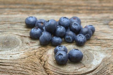Blueberries on a piece of old wood
