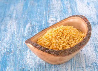 Soybean,Blue wooden bowls on wooden floor.