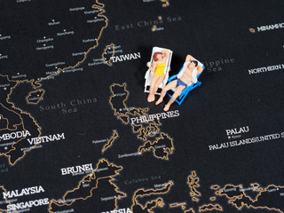 Holiday Concept, Miniature on map of Philippines