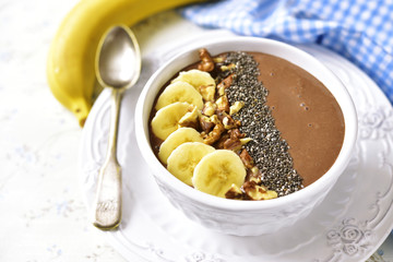 Chocolate banana smoothie with walnuts and chia seed.