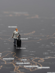 Miniature business man on map of China, Business Trip Concept