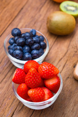 Fresh, Various fruit, strawberry, blueberry, kiwi.