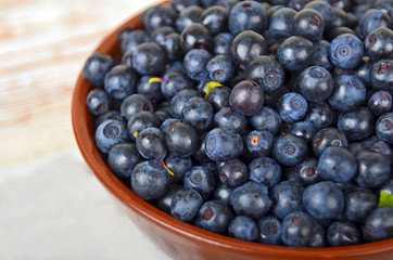 Blueberry on wooden background