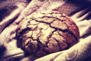 Fresh bread on wooden table ,vintage filter