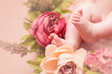 Lovely infant foot with flowers