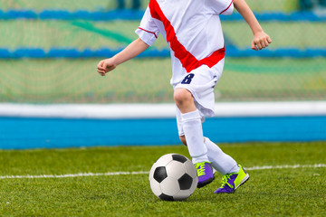 Young Boy Playing Soccer Football Match