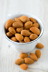 almonds on wooden surface