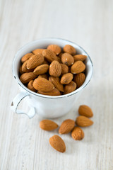 almonds on wooden surface