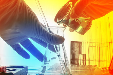 science laboratory test tubes with periodic table background