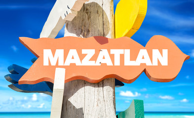 Mazatlan welcome sign with beach