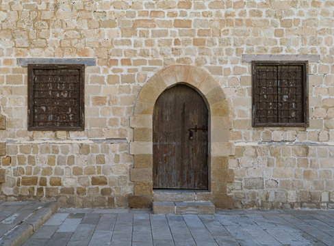 Door and windows of one of the rooms surrounding the main yard o
