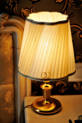 lamp on the bedside table in bedroom