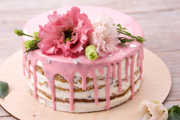 Carrot cake with pink glaze