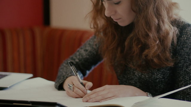 Young woman make markings