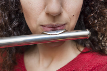 Blowing Into The Flute 