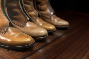 Leather Boots and Wooden Floor