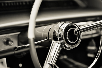 Classic car with close-up on steering wheel