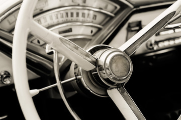 Fototapeta na wymiar Classic car with close-up on steering wheel