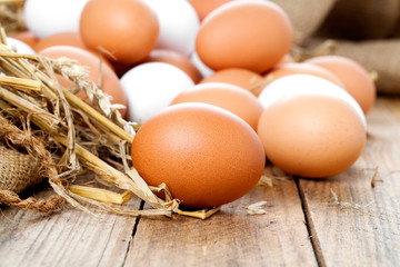 Eggs on wooden background