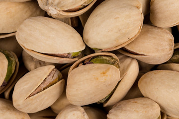 Pistachio nuts arranges as background