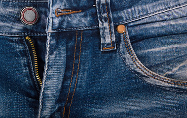 Blue denim jeans texture. Jeans background.