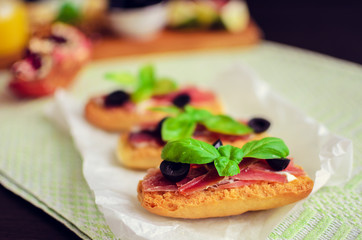 Delicious bruschetta with prosciutto