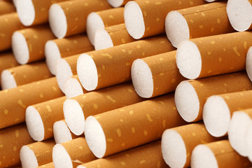 Cigarette filters background, close up from the back