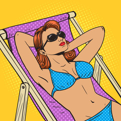 Woman sunbathing on the beach pop art vector