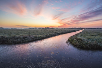 Sunrise at a Dutch farmland
