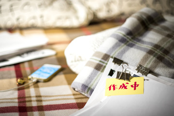 Making; Stack of Documents. Working or Studying at Bedroom.