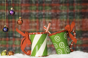 Christmas Mugs tied with a bow with peppermint sticks & ornament