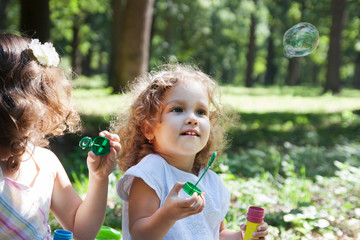 children and soap bubbles