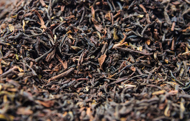 Background of dry black tea with flavors