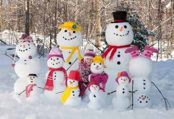 Girl with snowmen