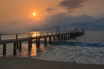 Old wood pier, sunset, Ko Samet island, Thailand