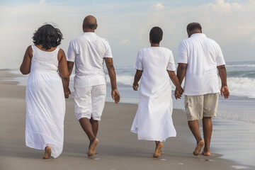 Happy Senior African American Couples Men Women on Beach
