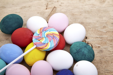 Fototapeta na wymiar multicolored lollipops and easter egg