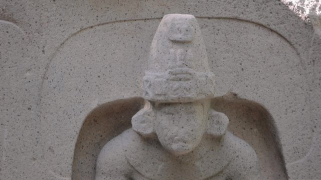 TABASCO, MEXICO CIRCA FEBRUARY 2014: Big olmec head carved in solid stone inside the park of La Venta