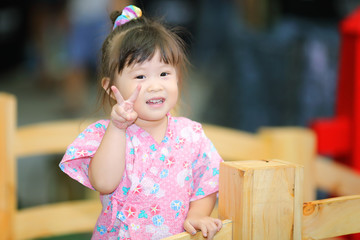 Little girl in yukata traditional dress