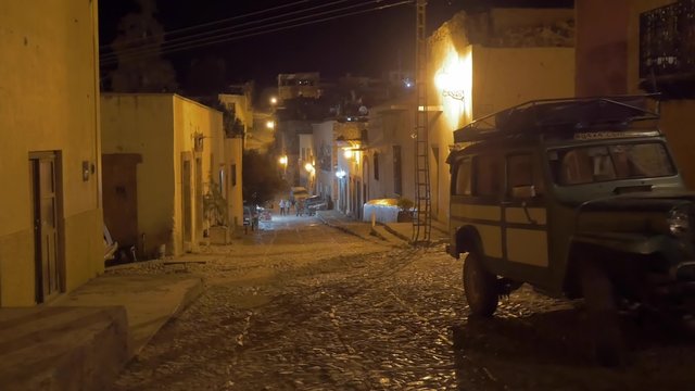 Old willy parked on a beautiful colonial city by night, Real de Catorce, Mexico