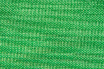 Green fabric texture for background. Background of linen fabric.
