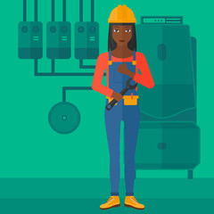 Cheerful repairer with spanner.