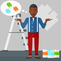 Man choosing paint color.