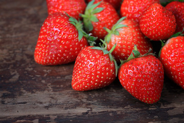 strawberries on the wooden background