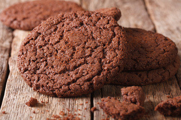 Fresh chocolate cookies with cracks macro on the table. Horizontal
