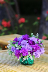 Beautiful  flower bouquet on wooden table