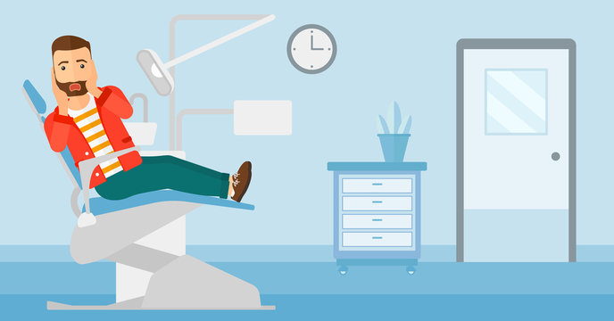 Frightened patient in dental chair.