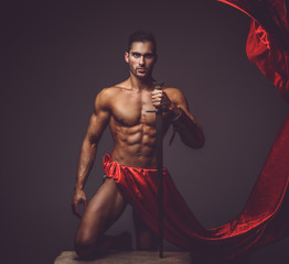 A man holding a sword.