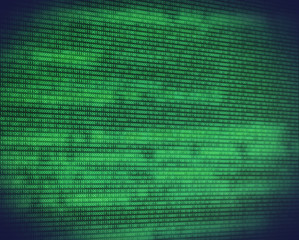 Abstract binary green code on digital screen