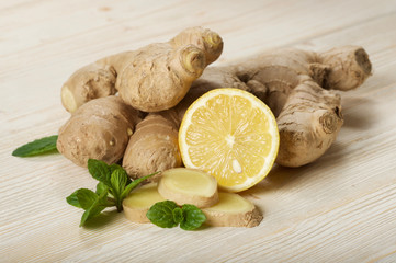 fresh ginger on wooden background
